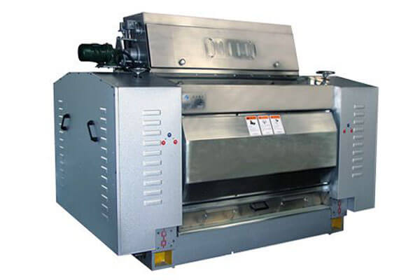 Machine à floconner les graines oléagineuses